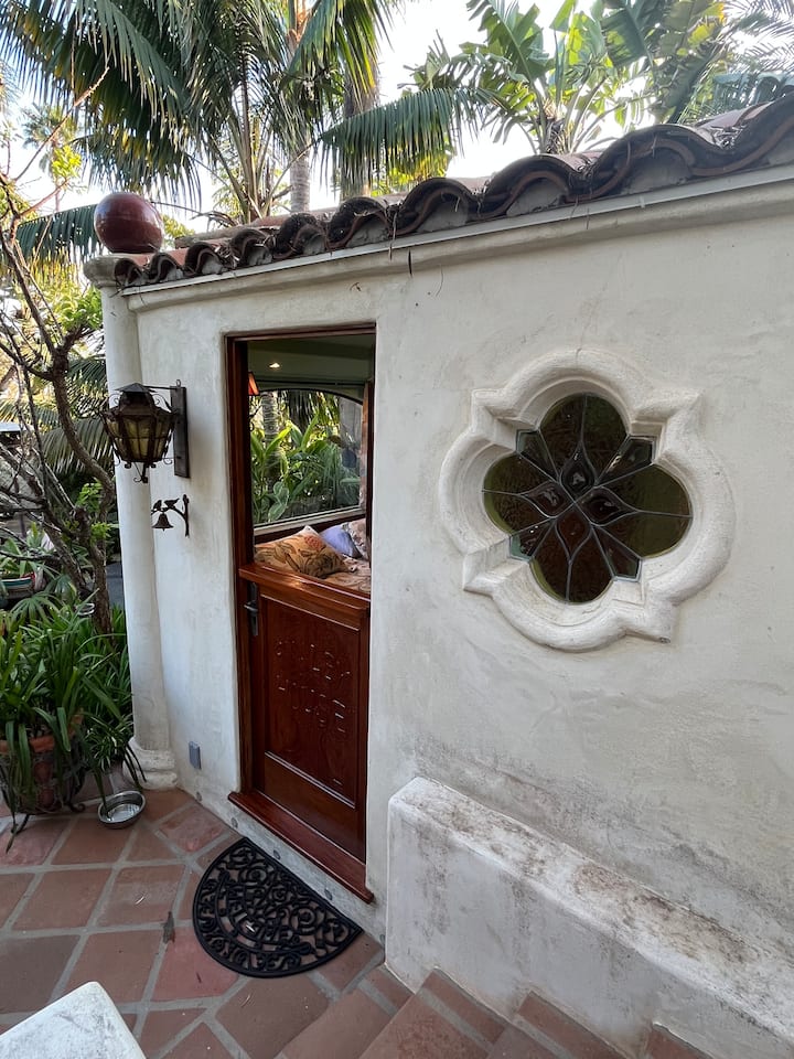 Tiny house in a peaceful shared garden.