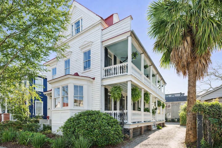 Historic Home with Large Porch + Palm Trees